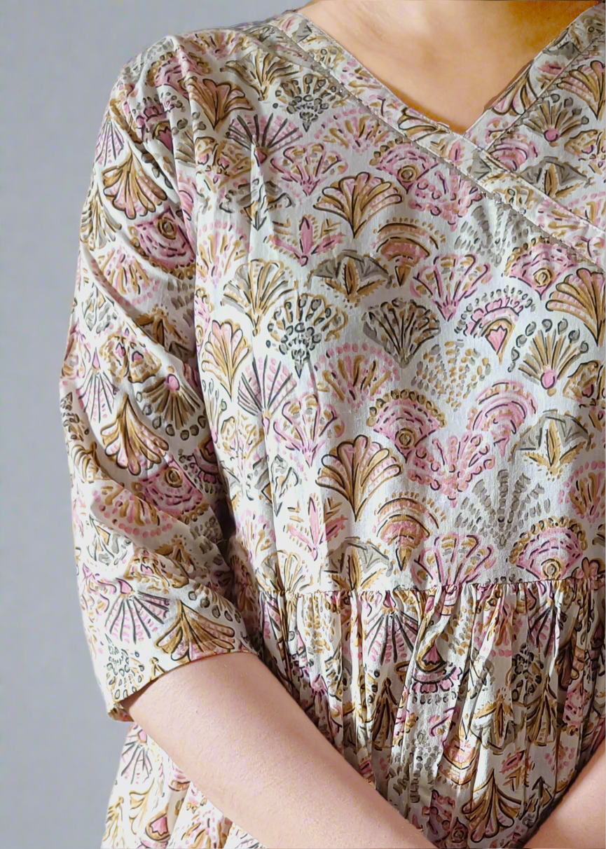 Patterned blouse with a neutral background