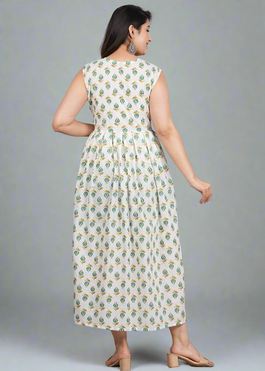 Woman wearing a floral dress against a gray background