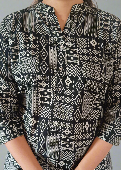 Black and white patterned shirt worn by a person
