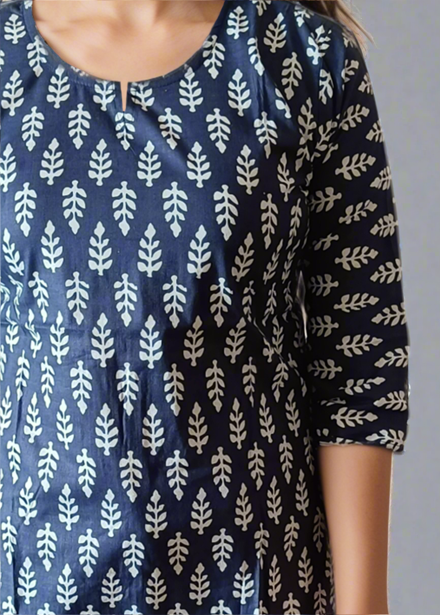 Navy blue tunic kurti with white leaf pattern worn by a person