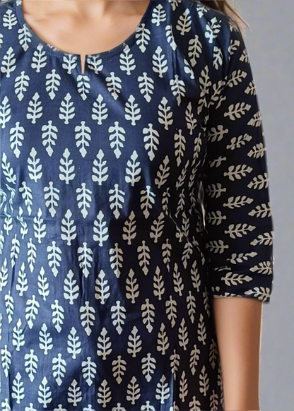 Navy blue tunic kurti with white leaf pattern worn by a person