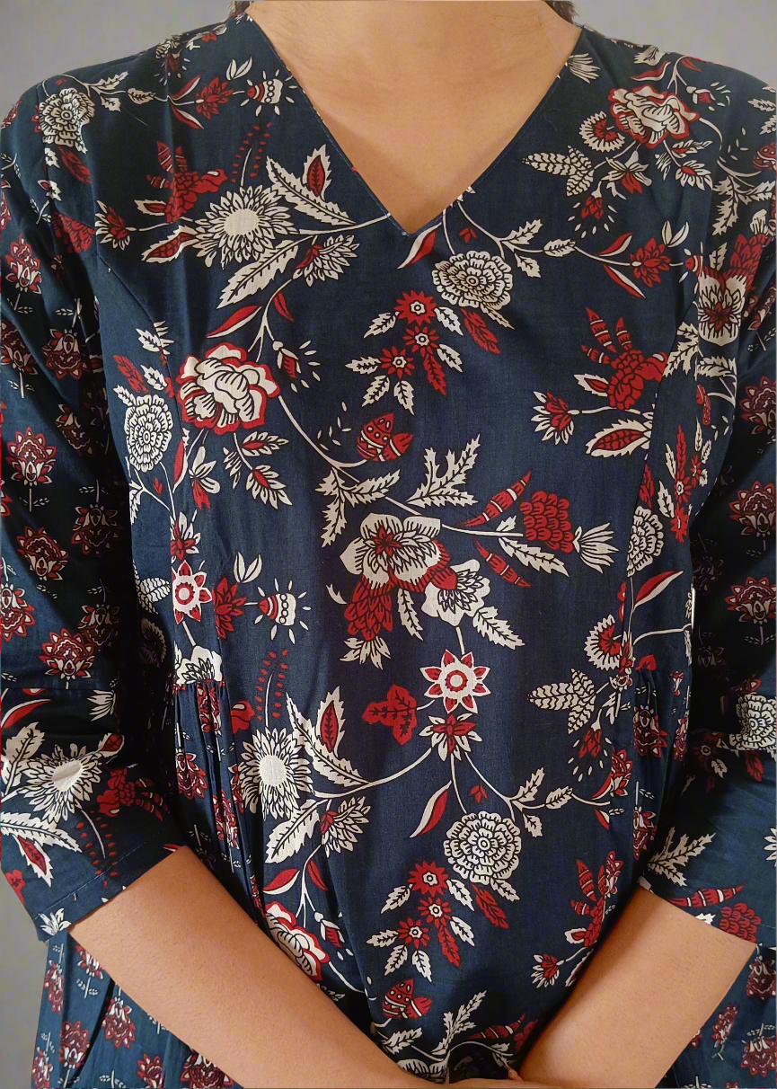 Navy blue dress with red and white floral pattern