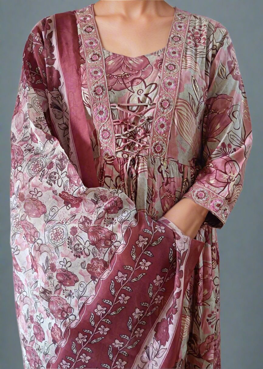 Traditional outfit with floral patterns on a plain background