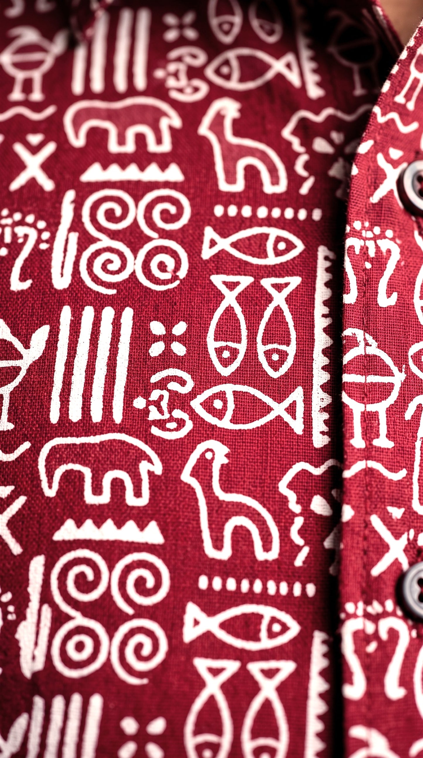 Close-up of a red fabric with white jaipuri patterns