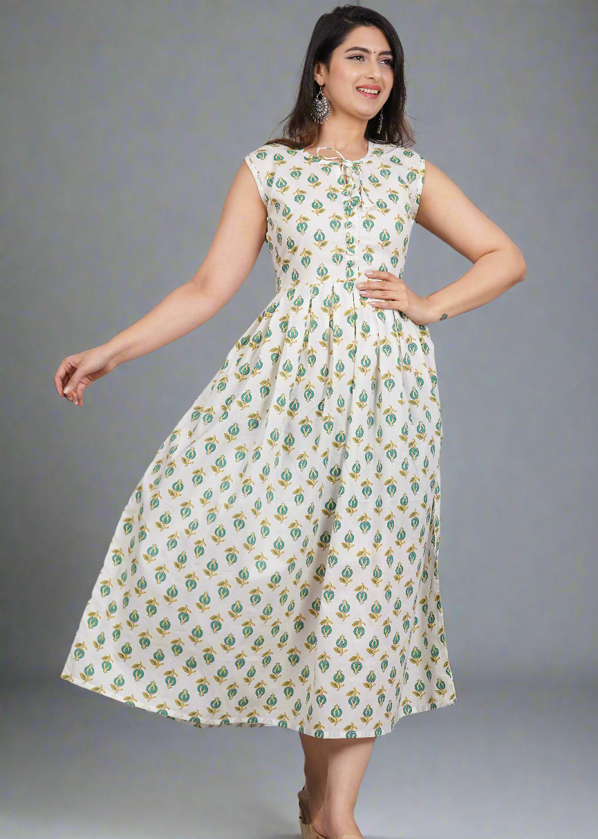 Woman wearing a floral dress against a gray background