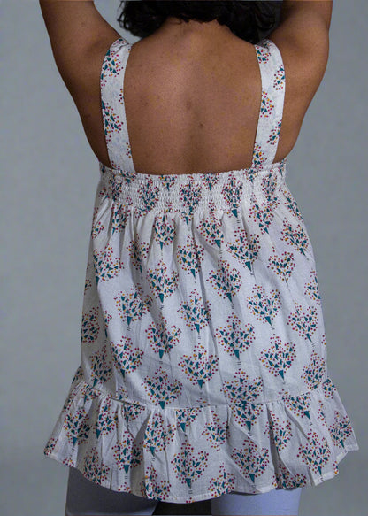 Floral dress with thin straps on a black background
