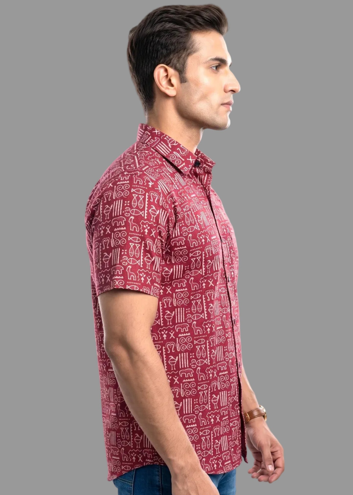 Man wearing a red patterned jaipuri shirt on a gray background
