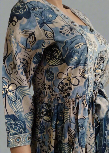 Blue floral patterned suit set dress with a plain background