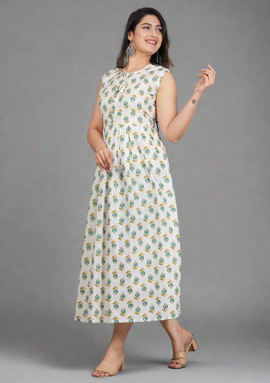 Woman wearing a floral dress against a gray background