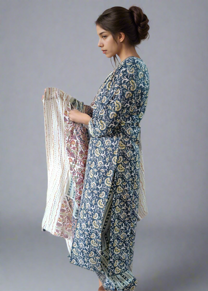 Woman floral suit set against a plain background